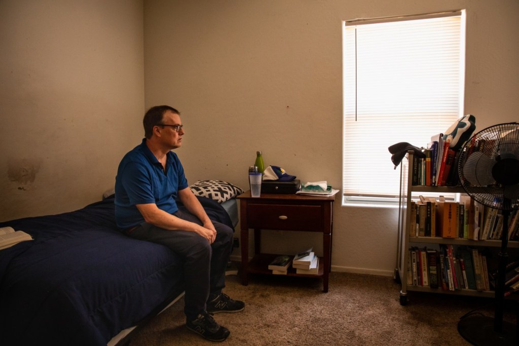 John Creamer sits in his room at a group home facility in Phoenix on June 4, 2021. Photo by Alberto Mariani | AZCIR
